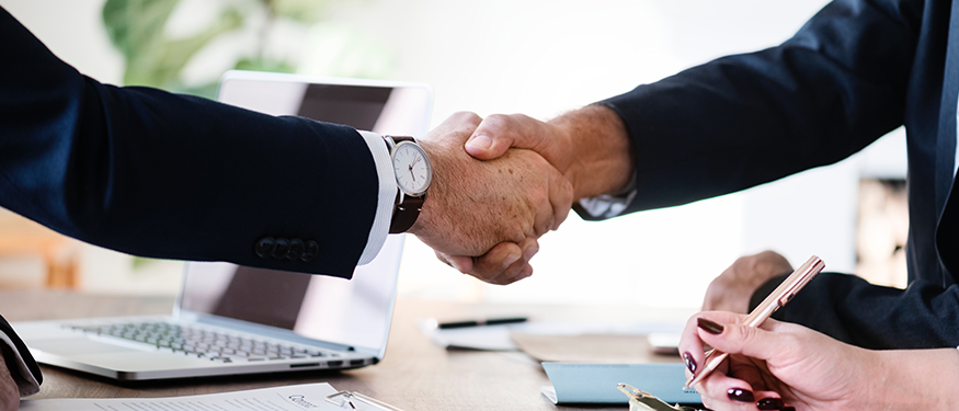 Handshake after making deal with a barter and trade website